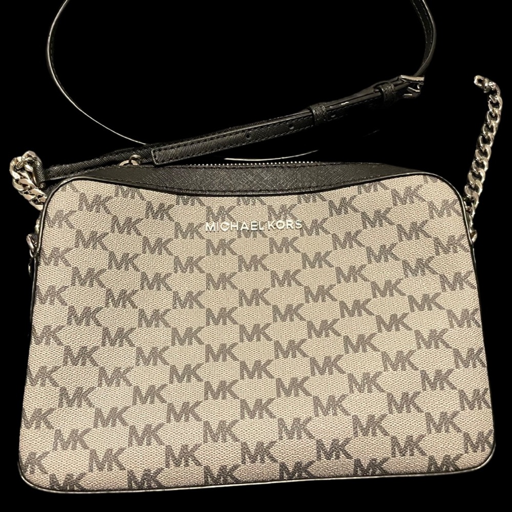 Black and grey Micheal Kors handbag